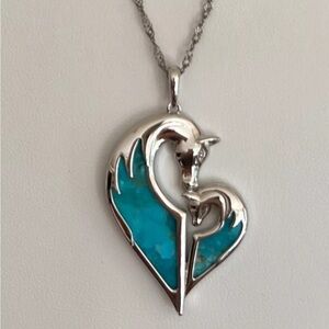 Double horse pendant is a blue composite turquoise stone 925 silver 18"